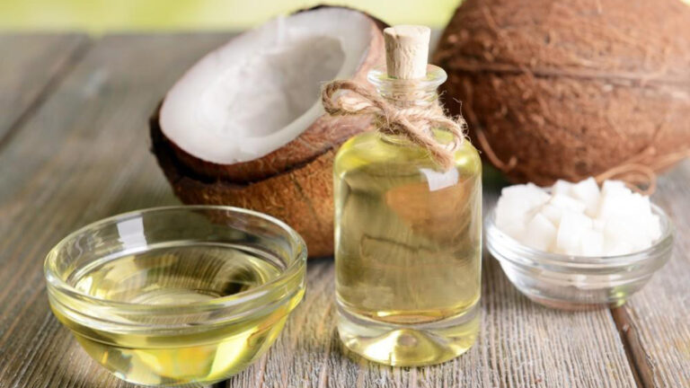 Using coconut oil for hair health in tamil